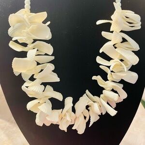 Vintage white seashell statement necklace. 32 inches long.